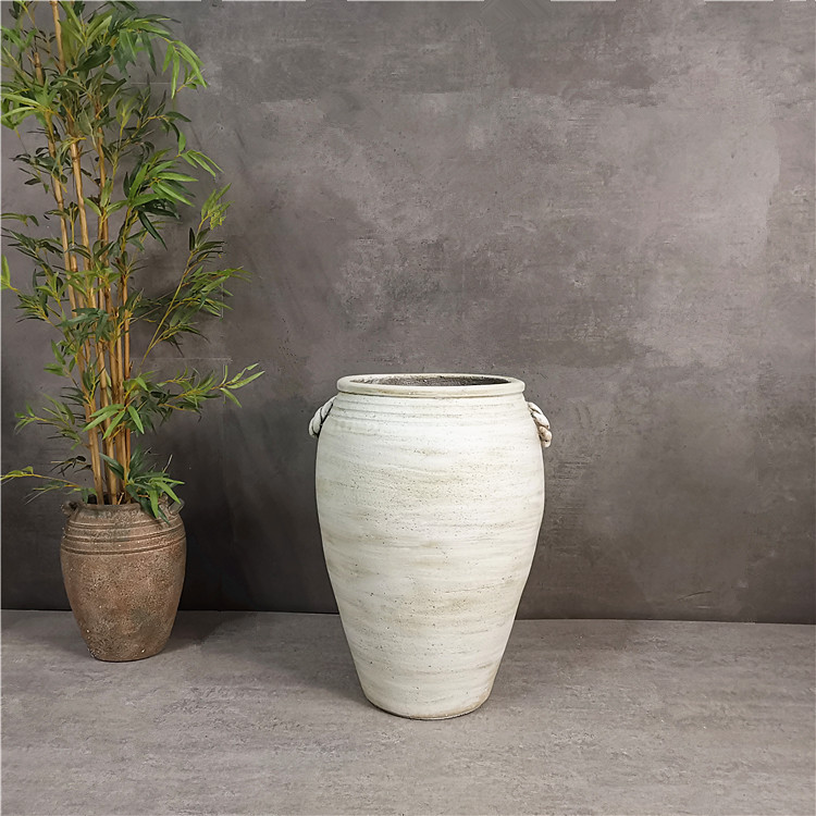北欧双耳酒坛形状土黄水泥材质落地花盆户外组合酒店商场大型摆设