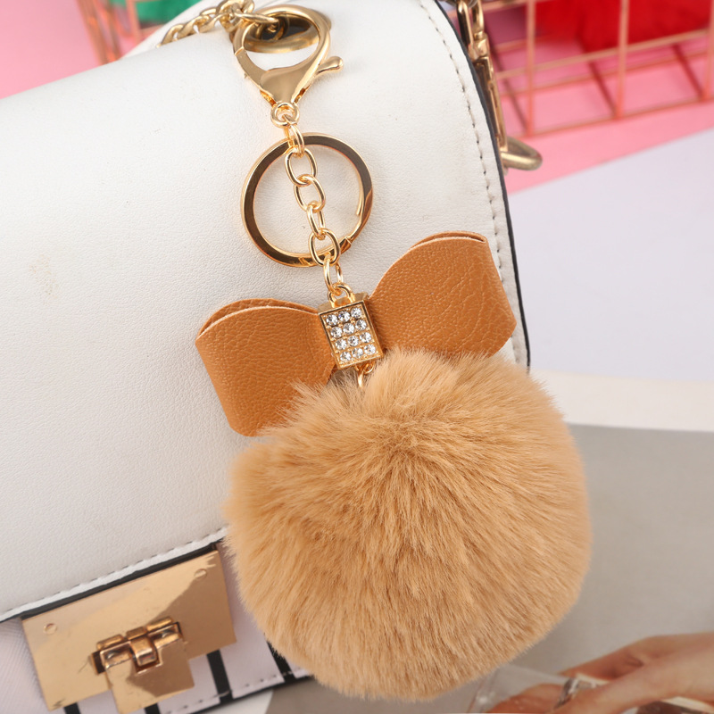 Factory Wholesale Supply Exclusive for Cross-Border 8cm Imitation Rex Rabbit Bow Hair Ball Keychain Creative Gift Bag Pendant