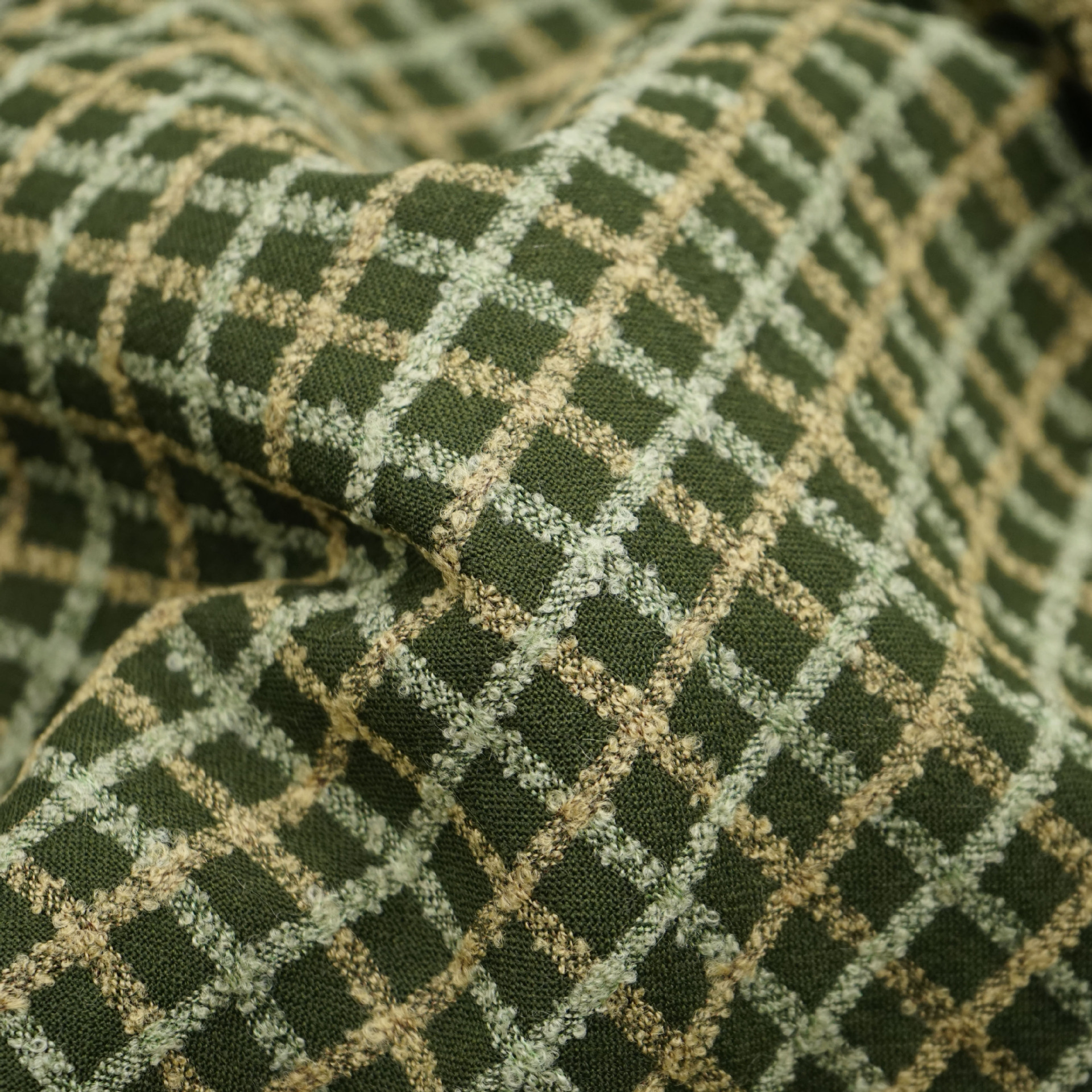 现货花式纱格子毛纺服装面料 圈圈纱军绿平纹梭织钢花呢羊毛布料