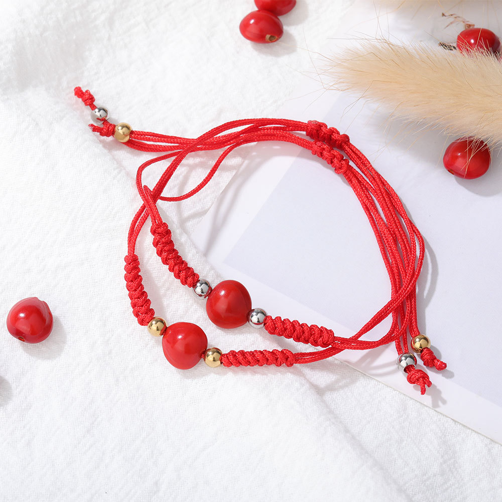 厂家手工编织天然相思豆血菩提子手串男女本命年红豆手链情侣饰品
