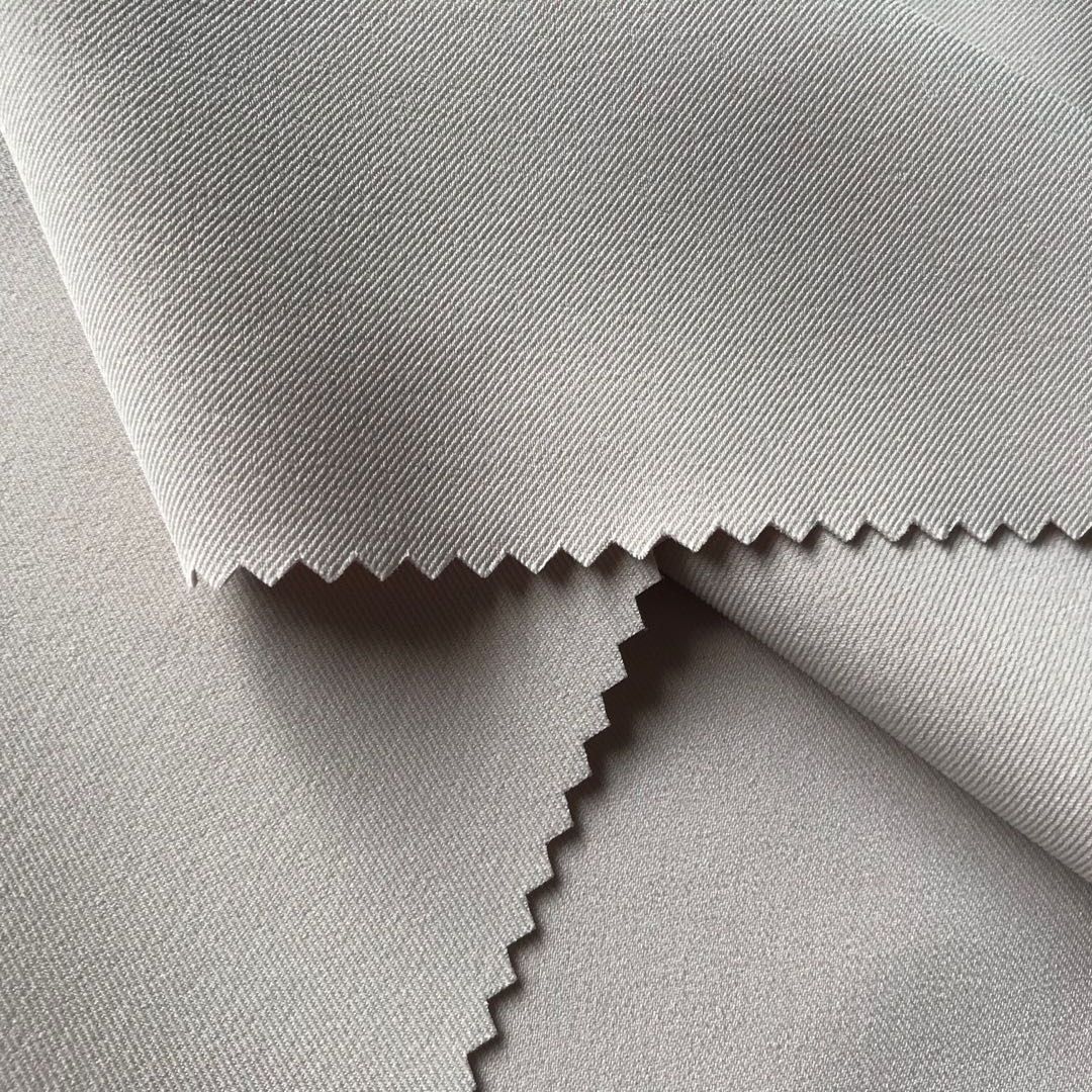 斜纹时装复合丝涤纶布料 工作服户外运动服50dx150d时尚面料定制