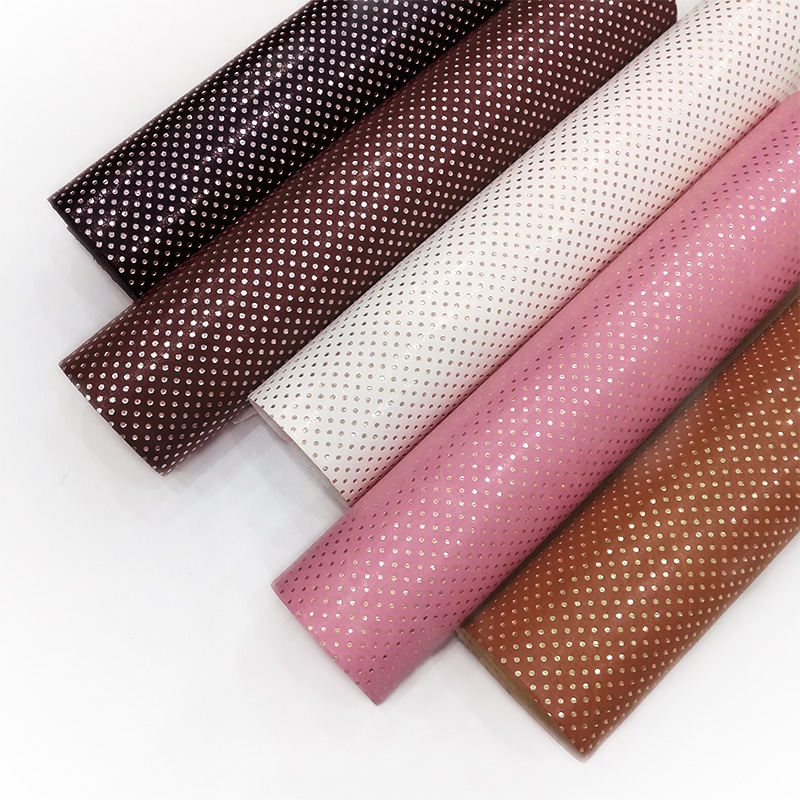 a4料厂家直批压纹人造革冲孔圆点pu皮革 箱包装饰鞋材手袋面料