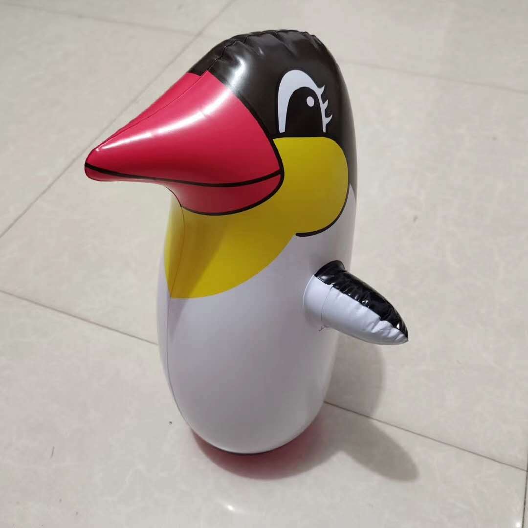 地摊热卖充气不倒翁小企鹅pvc充气卡通企鹅玩具地推礼品批发