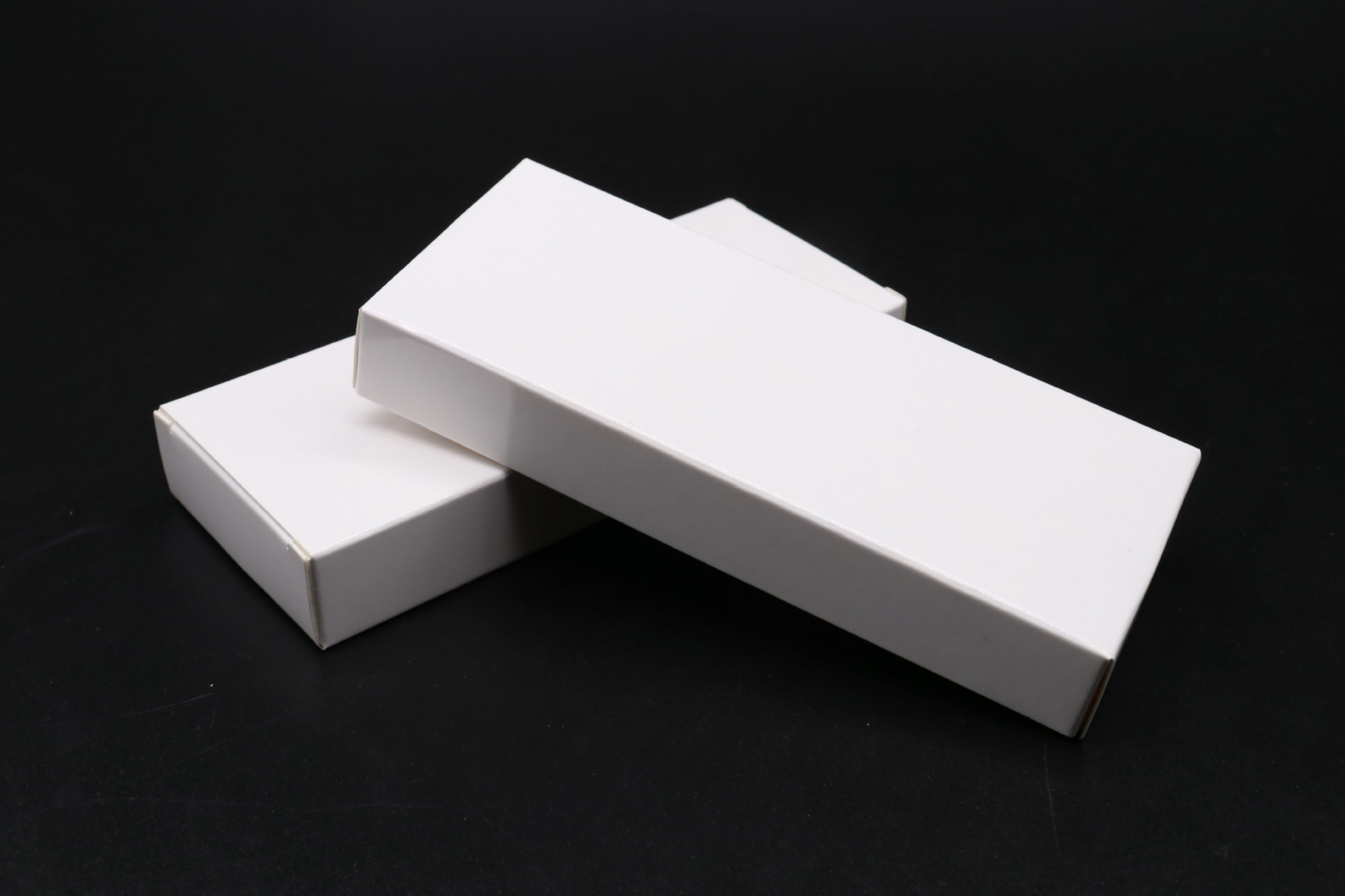 5cm 盒      型: 双插盒 制作工艺:过光胶 材     料:  400克单铜纸