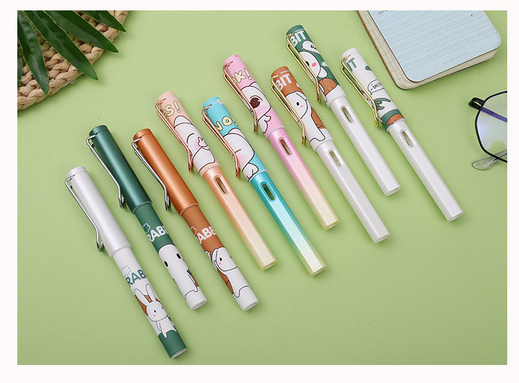独角鹿圆磨钢笔可换墨囊抽墨器两用铱金学生练字卡通刚笔批发零售