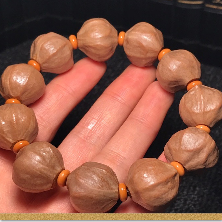 厂家直销精品原皮铁核橄榄核男士文玩易包浆铁核蒜头素串手工雕刻