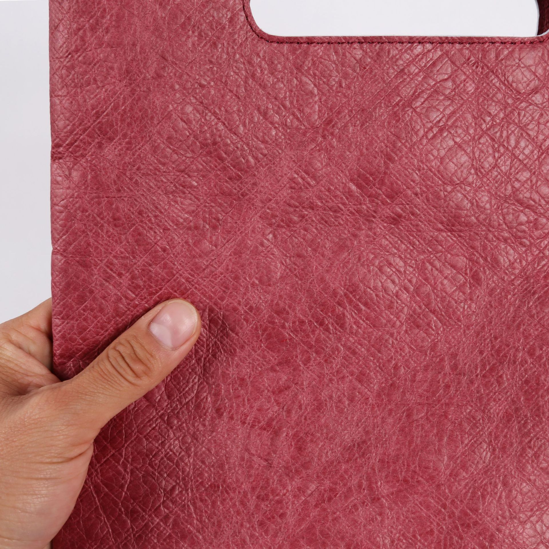 批发大王联名限量款杜邦纸堡包黑金m手拿包alex牛皮纸包包手提袋