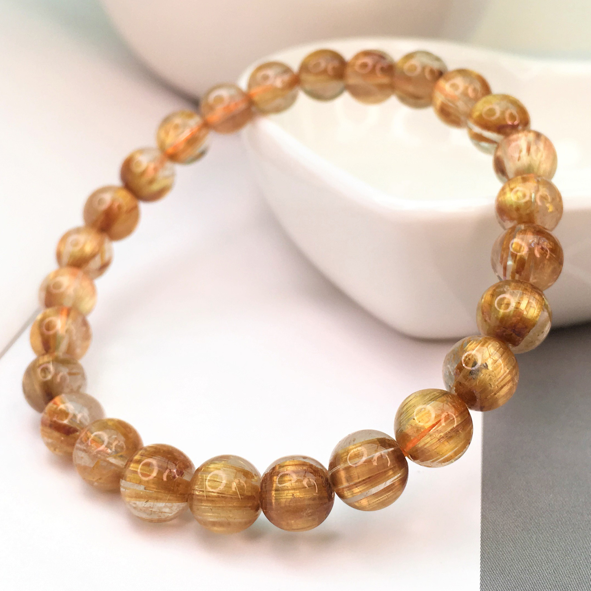 柯唐珠宝时尚水晶招财金发晶手链男女单圈钛晶手串跨境货源可塘厂