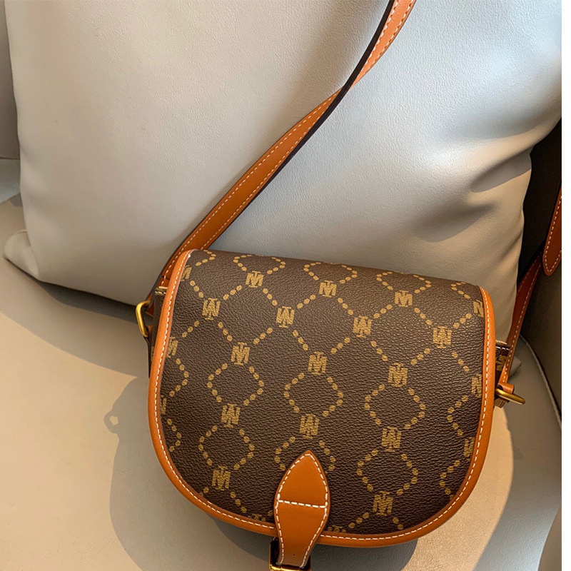 包包女2020春季新品小mk马鞍相机包系列老花半圆马鞍包复古斜挎包