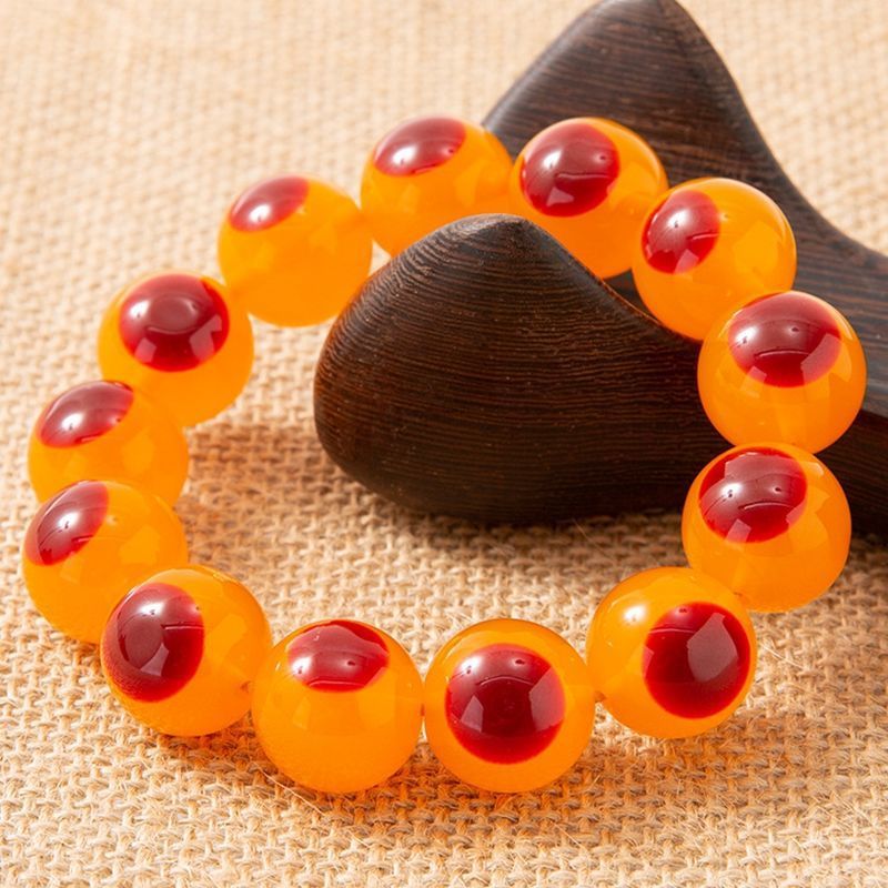 厂家直销仿鹤顶红鸟头手链浮盐水琥珀蜜蜡手串文玩古玩收藏