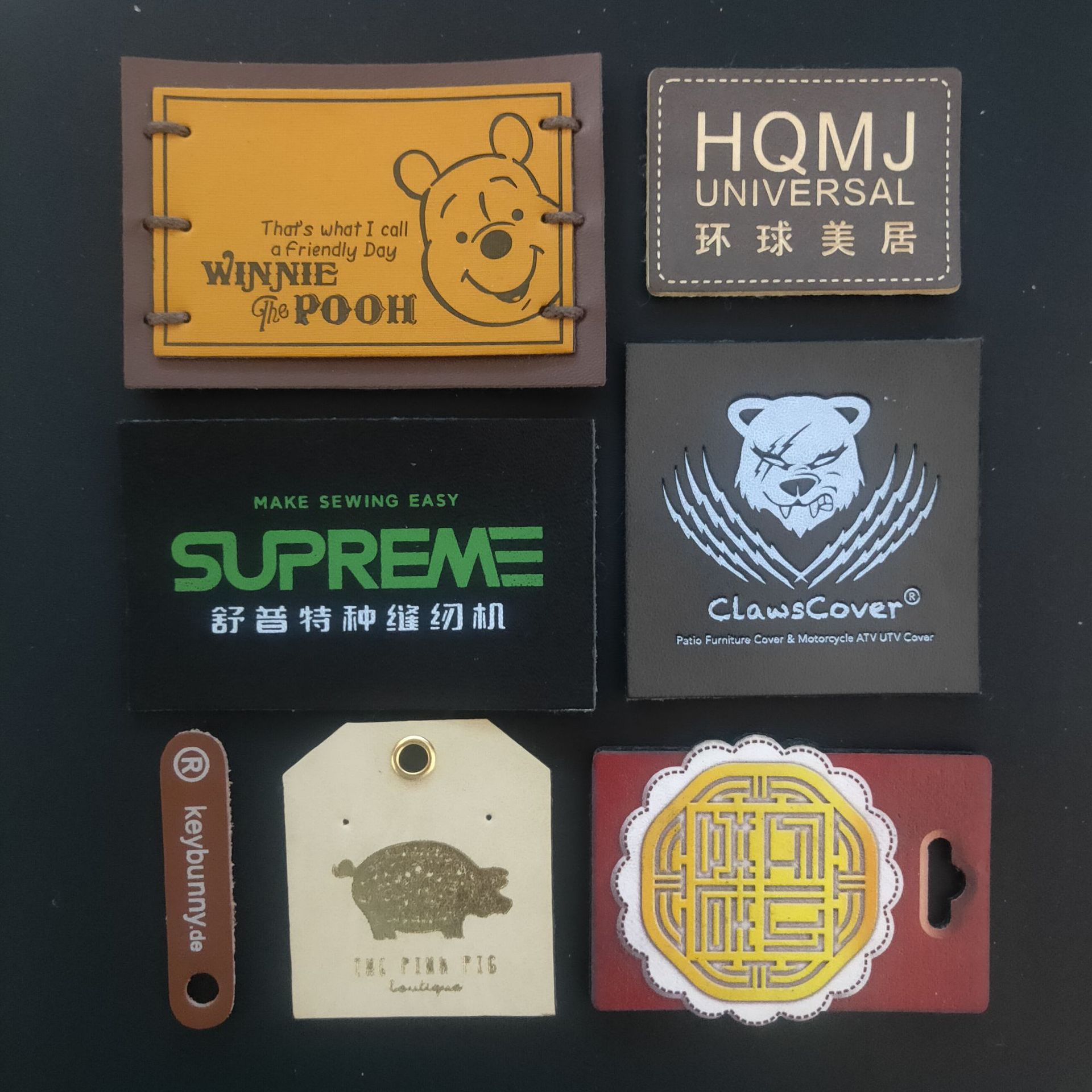 厂家直销皮牌定做压变标印花标仿皮超纤皮pu皮革牛仔裤皮标定制