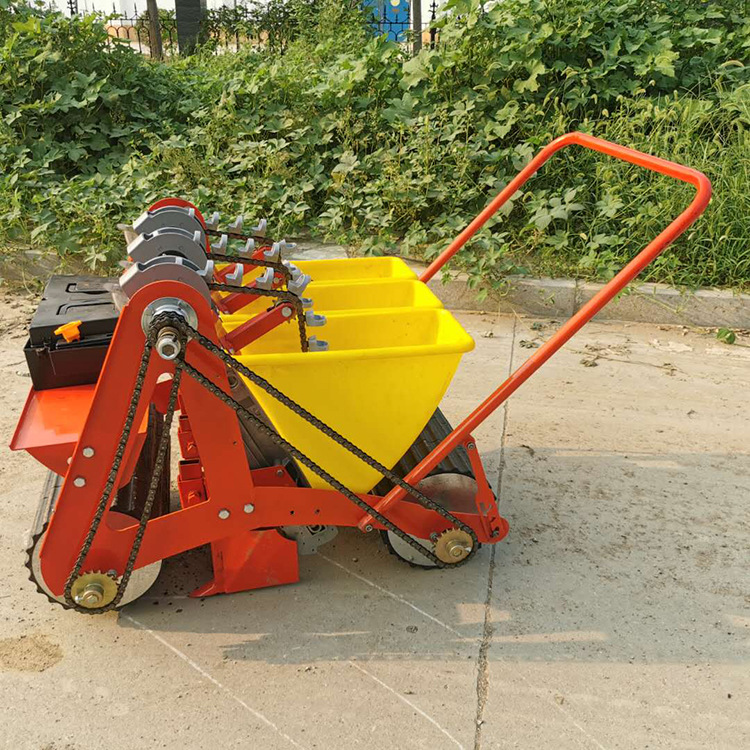 2行3行电动大蒜播种机四轮车牵引蒜头播种机行距株距可定栽蒜机