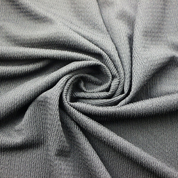 经编涤纶氨纶弹力针织提花凹凸泡泡纱绉布褶皱布时装女装童装面料