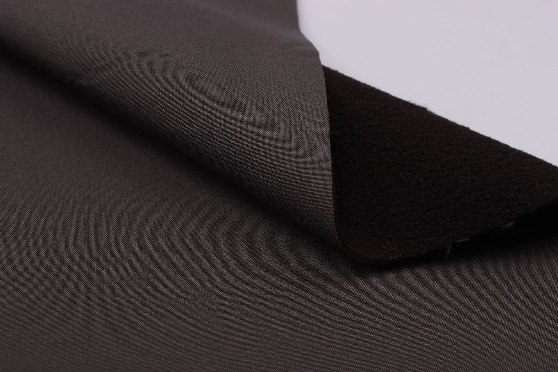 softshell软壳面料100d四面弹三合一贴tpu透湿膜单刷单摇粒绒面料