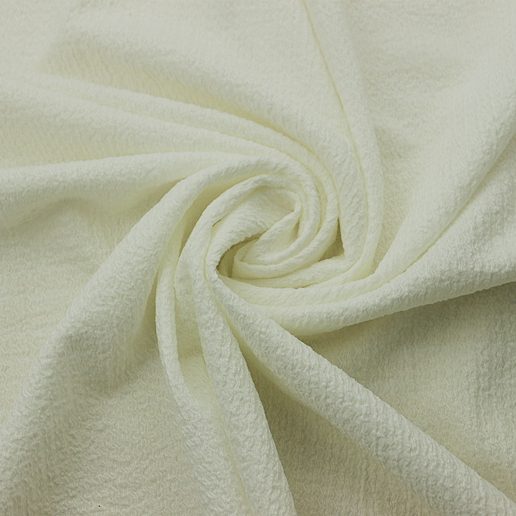 经编涤纶氨纶弹力针织提花凹凸泡泡纱绉布褶皱布时装女装童装面料