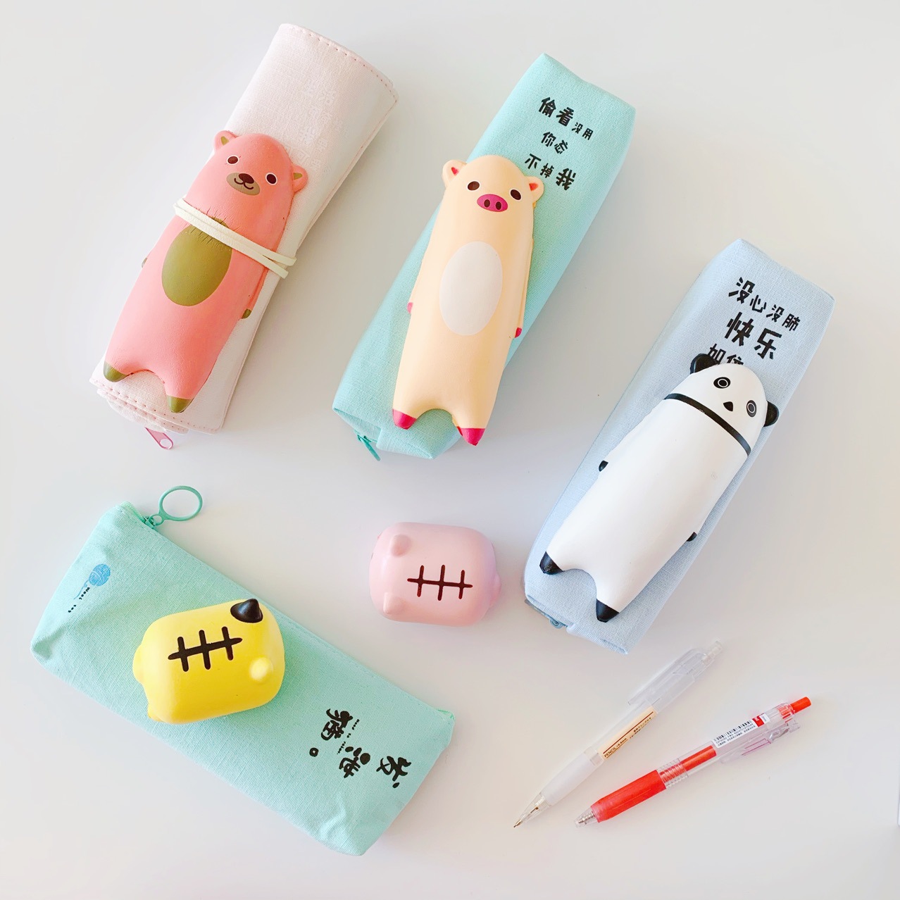 创意发泄笔袋卡通玩偶慢回弹笔袋学生文具袋卷笔袋三角铅笔袋
