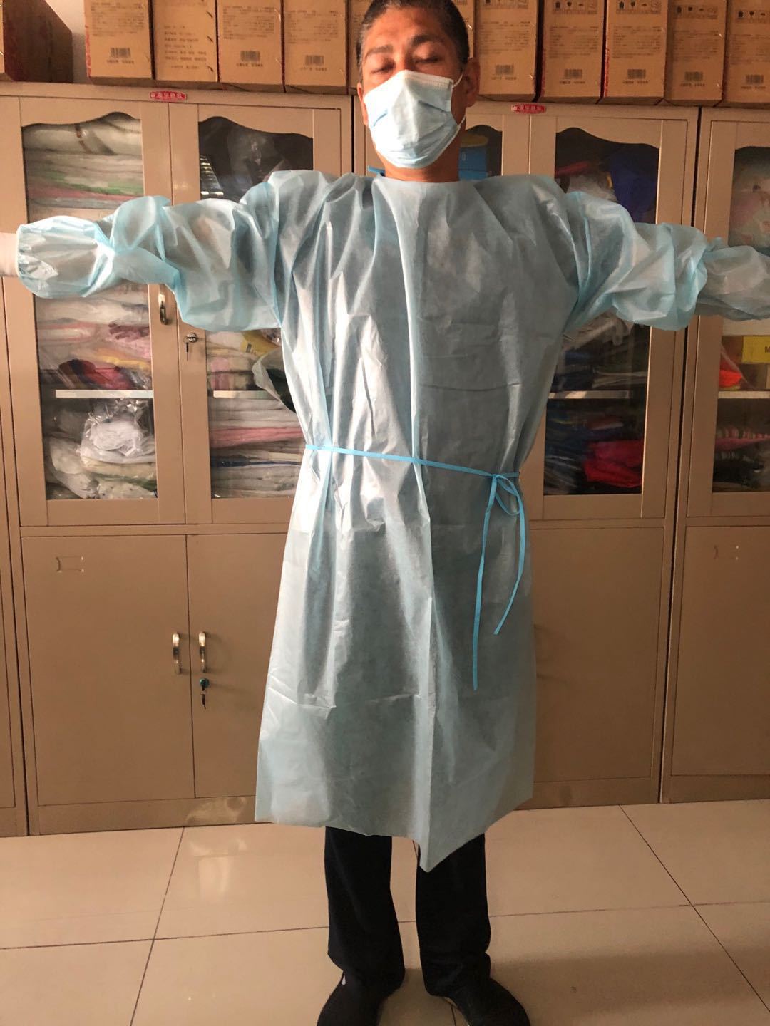 出欧美淋膜无纺布全包围防护隔离衣非医用pp pe材质一次性防护服