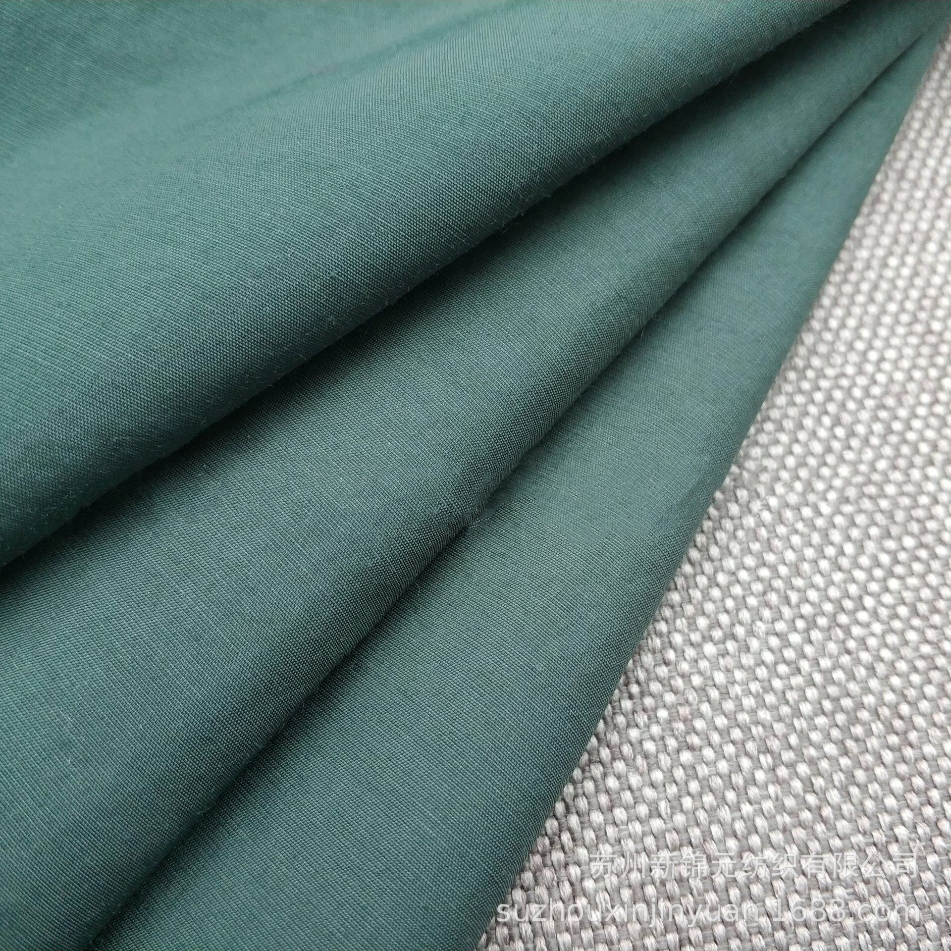厂家直销40d60s70d锦棉梭织防水风衣夹克面料时装外套面料布料