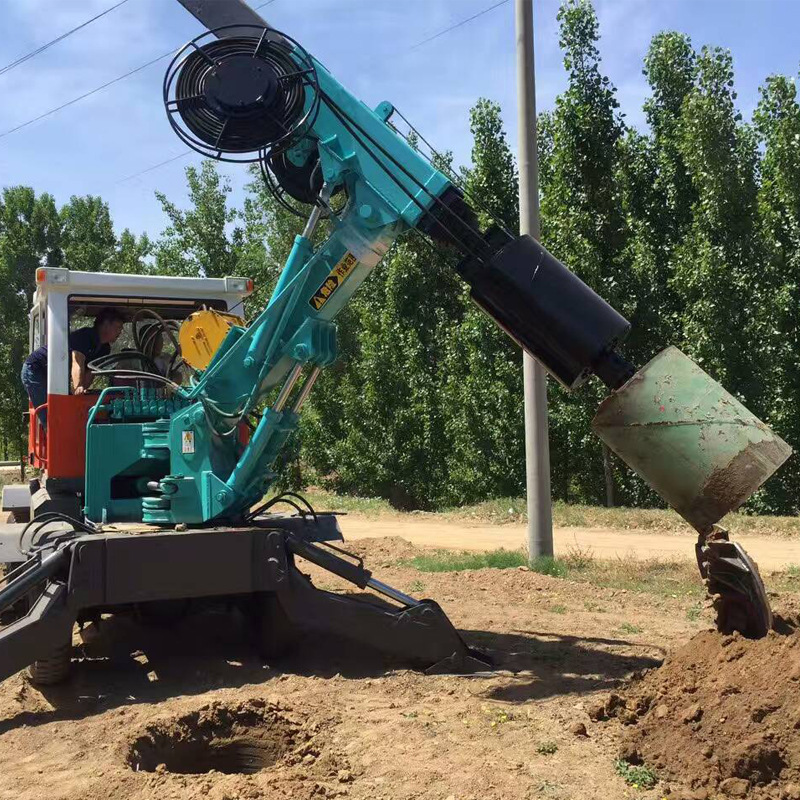 电杆挖坑机电杆钻眼机930装载机挖坑机河北电杆挖坑厂家供应