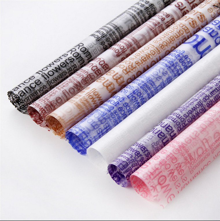 英文雾面纸半透明雾光纸平安夜塑料玻璃纸批发鲜花包装材料