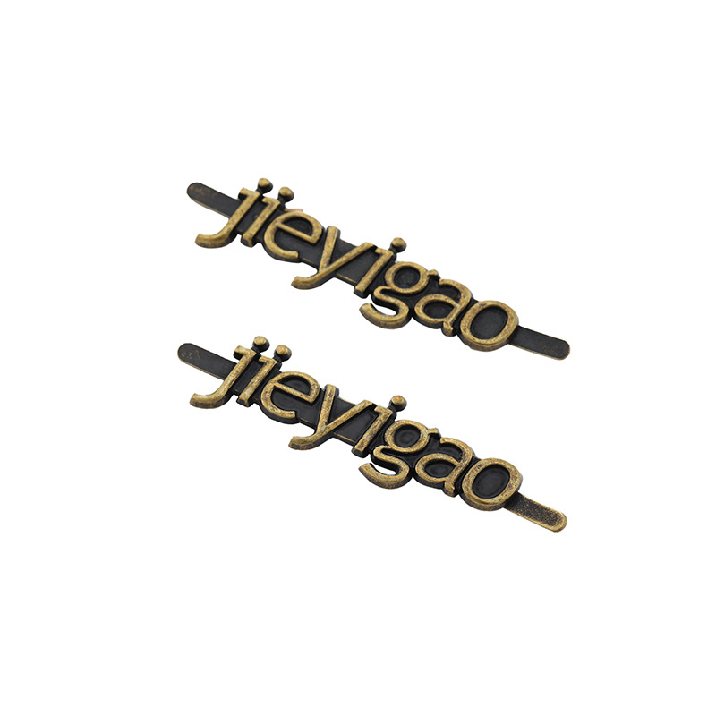 [Customized from 500] English Hollow Metal Pins Electroplating Stamping Leather Bag Logo Hardware Accessories Brand
