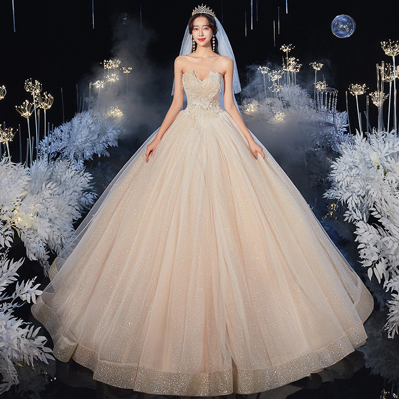 高档抹胸婚纱2020新款简约森系超仙梦幻韩式主纱香槟色齐地款新娘