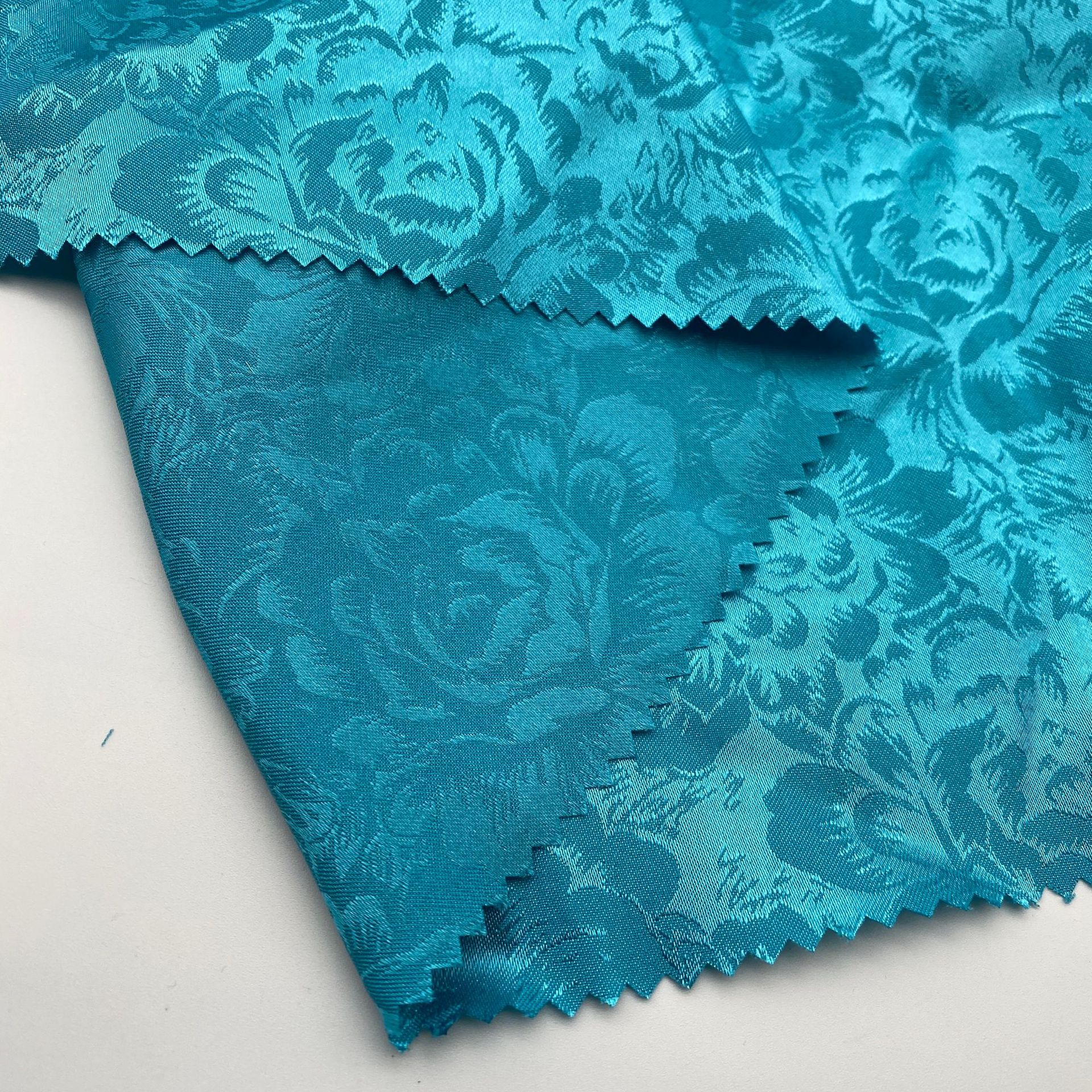 富贵花开提花面料微弹 仿真丝缎面素色涤纶提花布料 现货直销