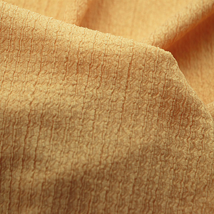 经编涤纶氨纶弹力针织提花凹凸泡泡纱绉布褶皱布时装女装童装面料