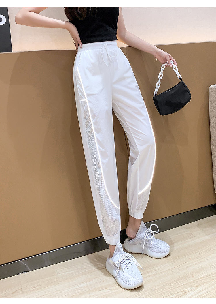 1013#视频实拍百搭休闲夏季反光条镂空拼接网纱裤子哈伦九分裤