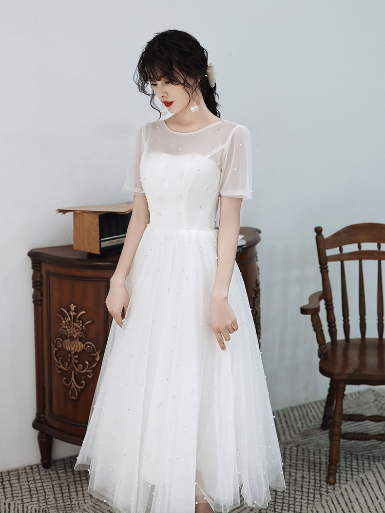 旅拍轻婚纱2021新款白色简约一字肩中长款新娘森系婚礼小晚礼服女