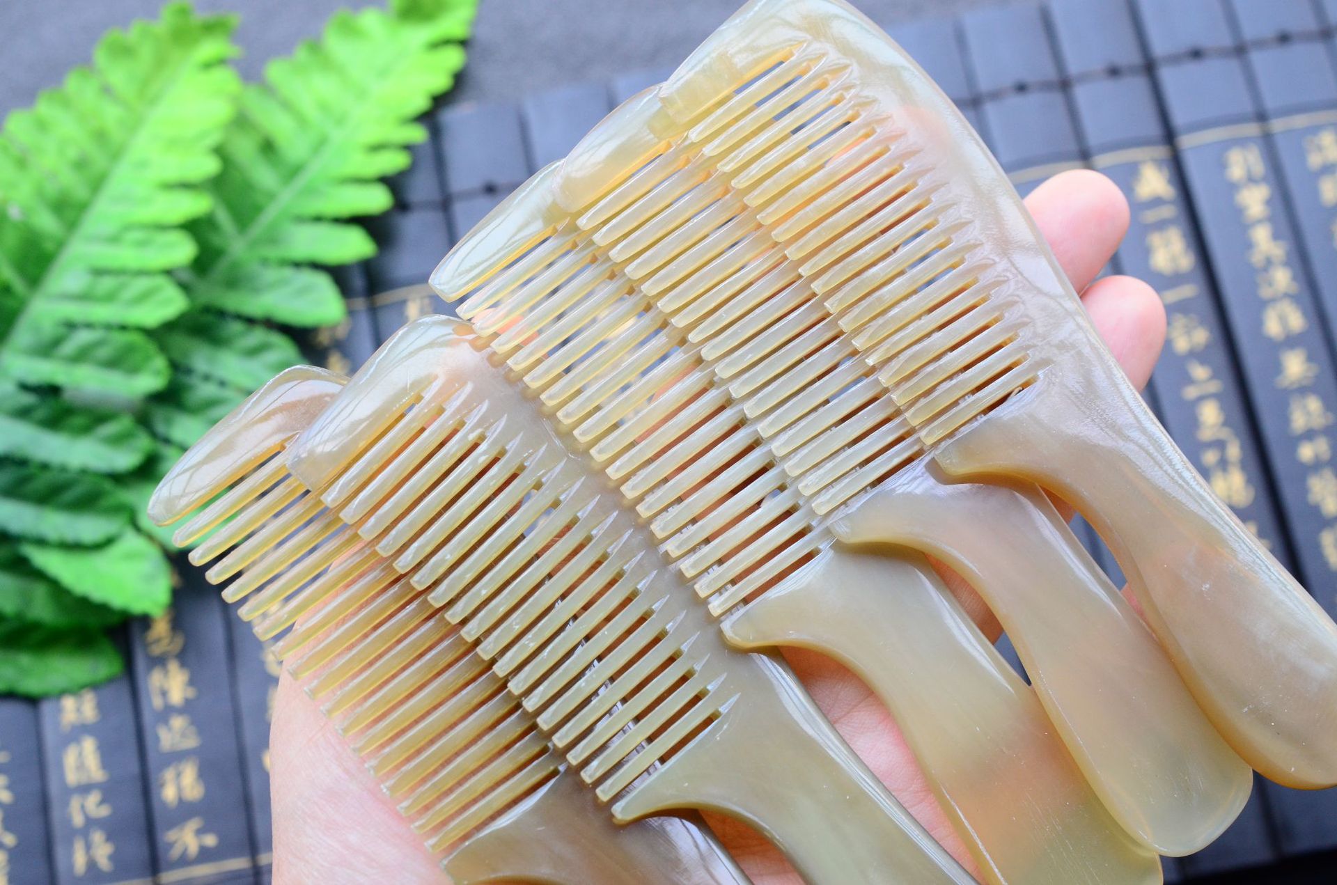 牛角梳子正品天然水牛按摩梳子女脱包包头部经络防五齿按摩梳手柄