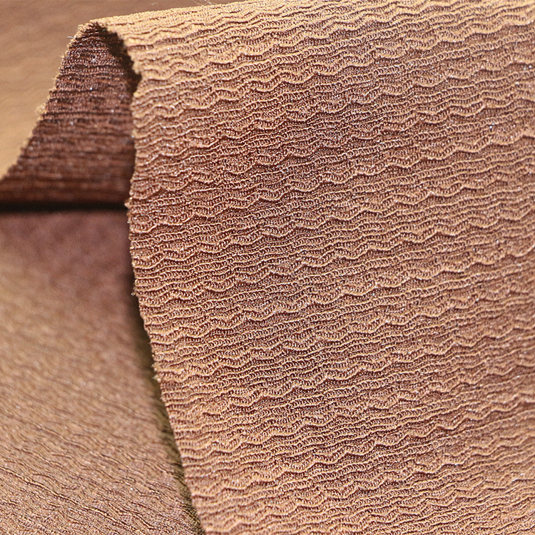 经编涤纶氨纶弹力针织提花凹凸泡泡纱绉布褶皱布时装女装童装面料