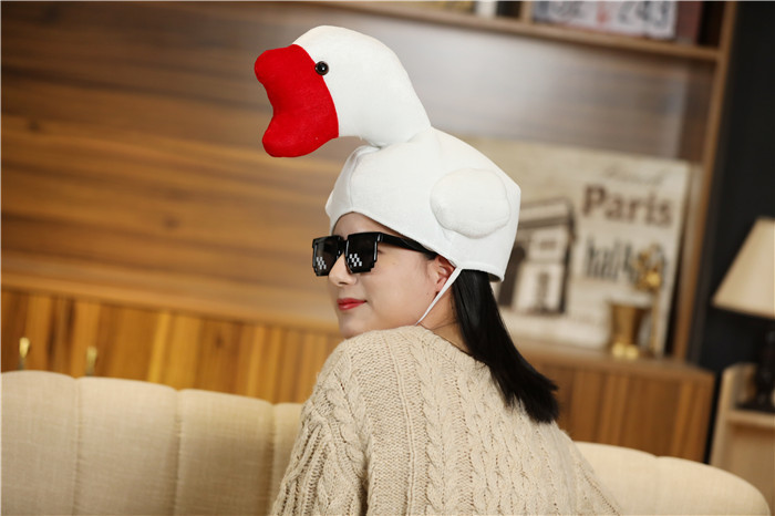 商品描述适用年龄少年(7-14岁)高度成人儿童都可以戴颜色全身白鹅公仔