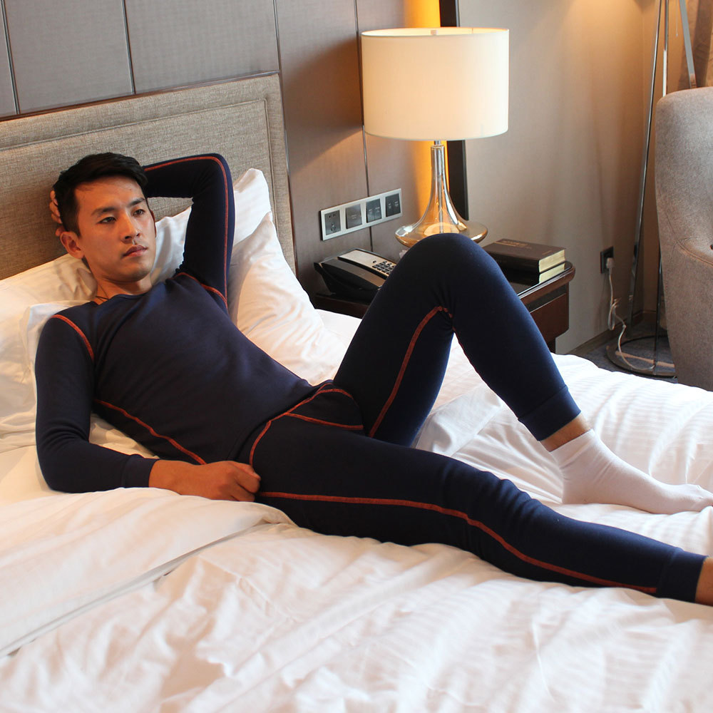 男士加绒秋冬保暖两件套线条激凸囊袋保暖打底纯色性感修身套装男