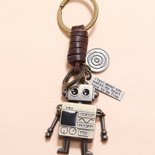 简约复古编织手脚可活动机器人牛皮钥匙扣创意镶钻钥匙链包包挂件