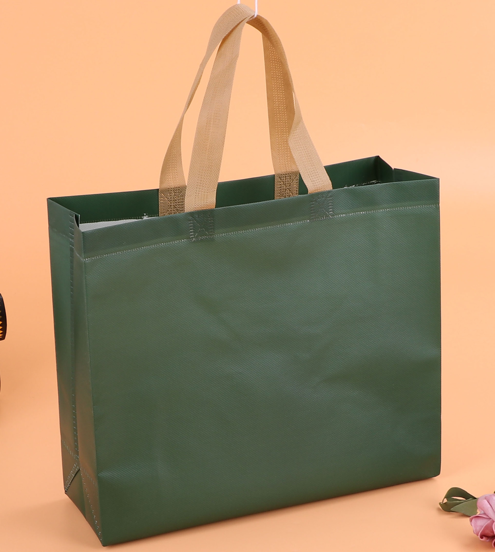 现货无纺布覆膜批发logo制作彩印彩色手提购物宣传服装防水袋子觅