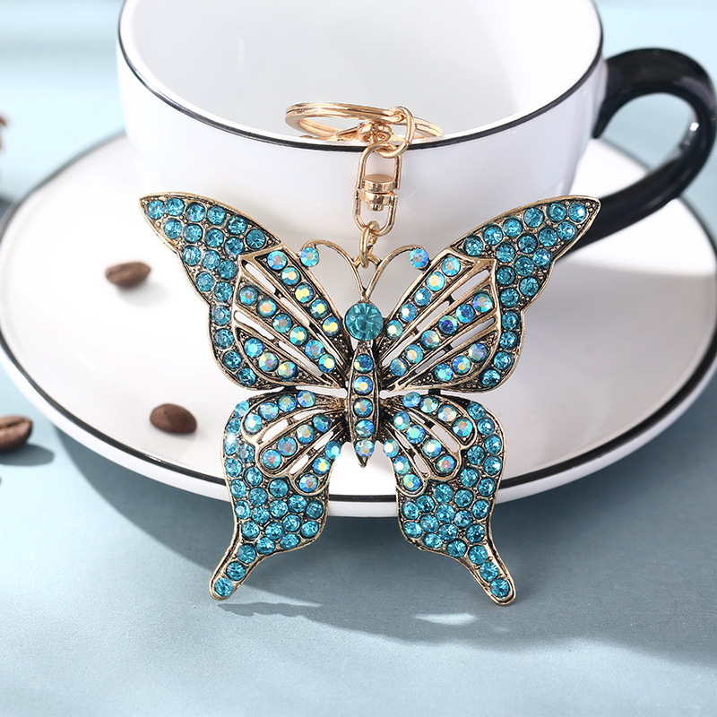 Cross-Border Color Diamond Studded Hollow Butterfly Metal European and American Keychain Pendant Little Creative Gifts Handbag Pendant in Stock