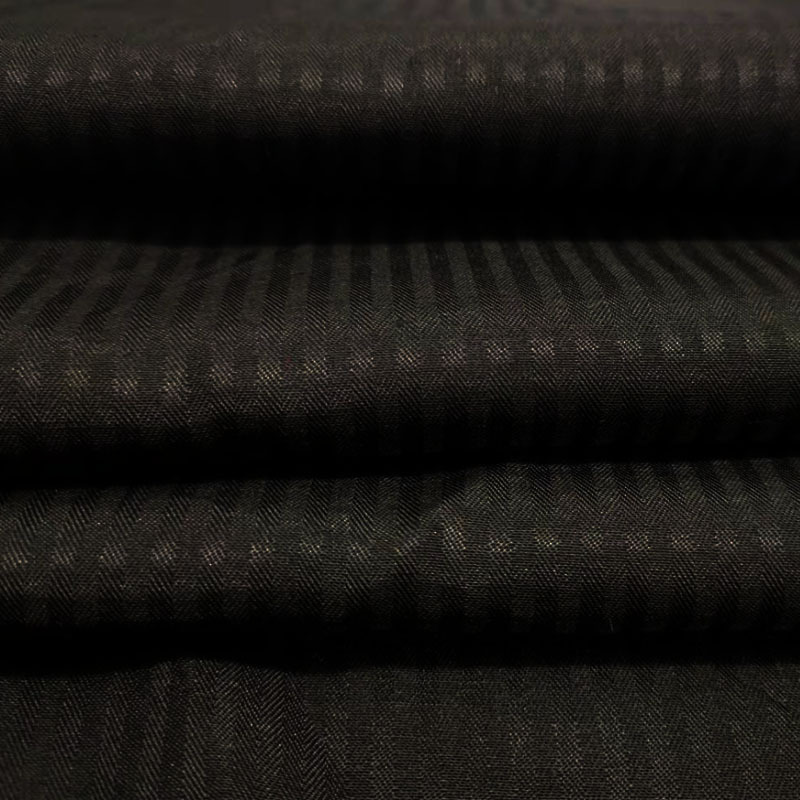 现货供应全涤黑色鱼骨纹人字纹斜纹口袋布里布西装腰衬面料批发