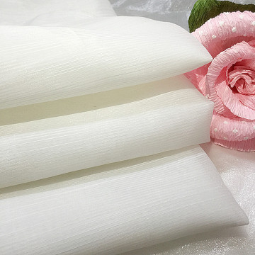 竹节纱单丝竹节纱欧根纱面料 女装提花薄款印花面料网纱提花时装