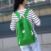 东诺韩版帆布大学生书包双肩包女潮学院风小中学生旅行背包
