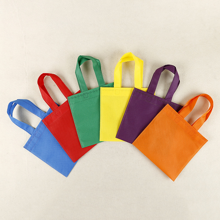 Foreign Trade Cross-Border in Stock Color Theme Non-Woven Portable Shopping Bag Gift Packaging Candy Nonwoven Fabric Bag