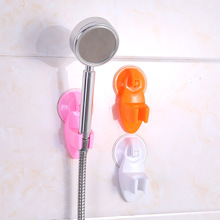 批发免打孔花洒支架浴室喷头塑料挂架吸盘式可调节淋浴头固定器
