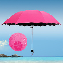 厂家批发创意三折叠黑胶遇水开花伞礼品广告伞晴雨伞可做LOGO