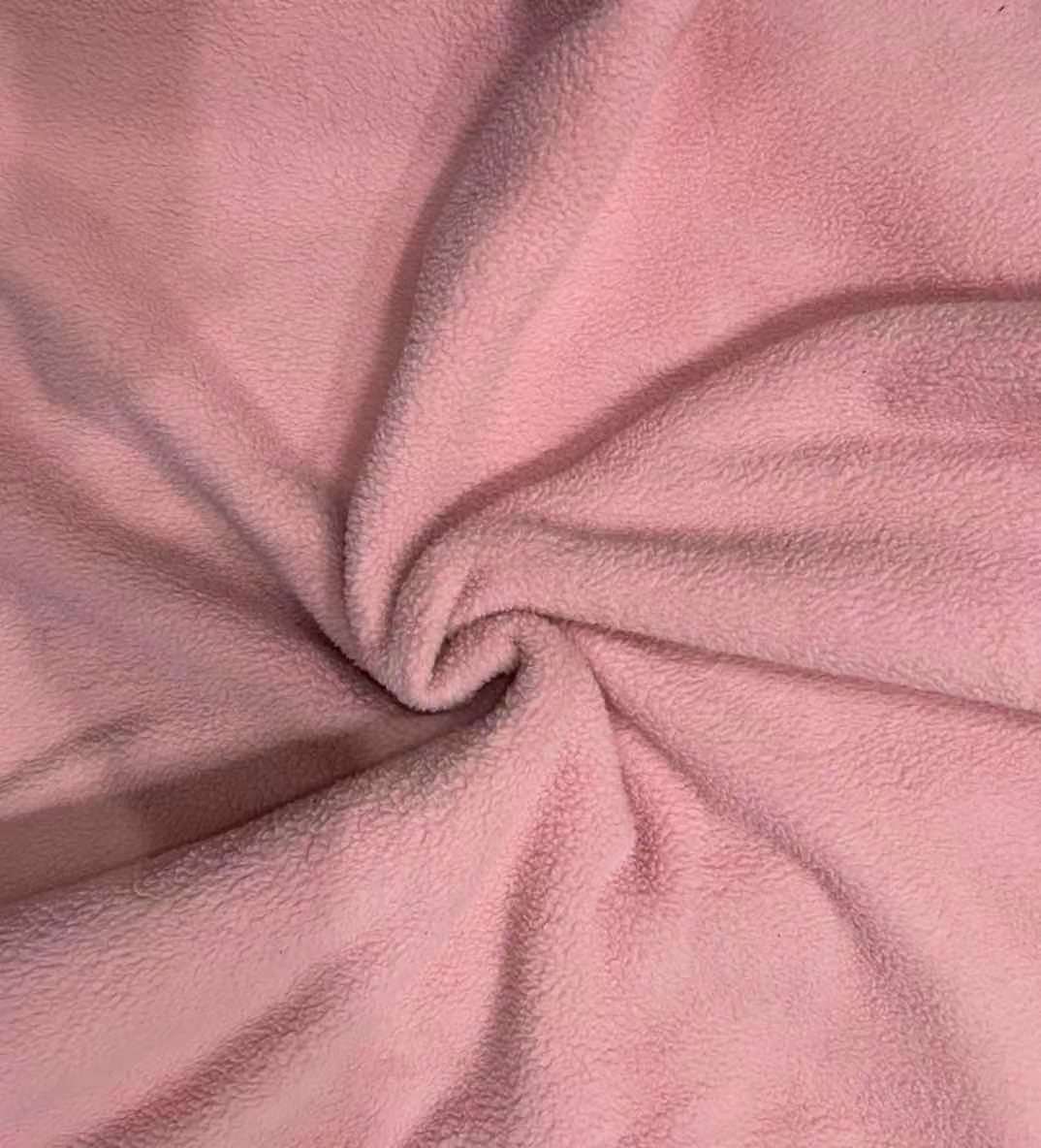 双面肉粉色羊羔绒,一面粗粒,一面细粒.