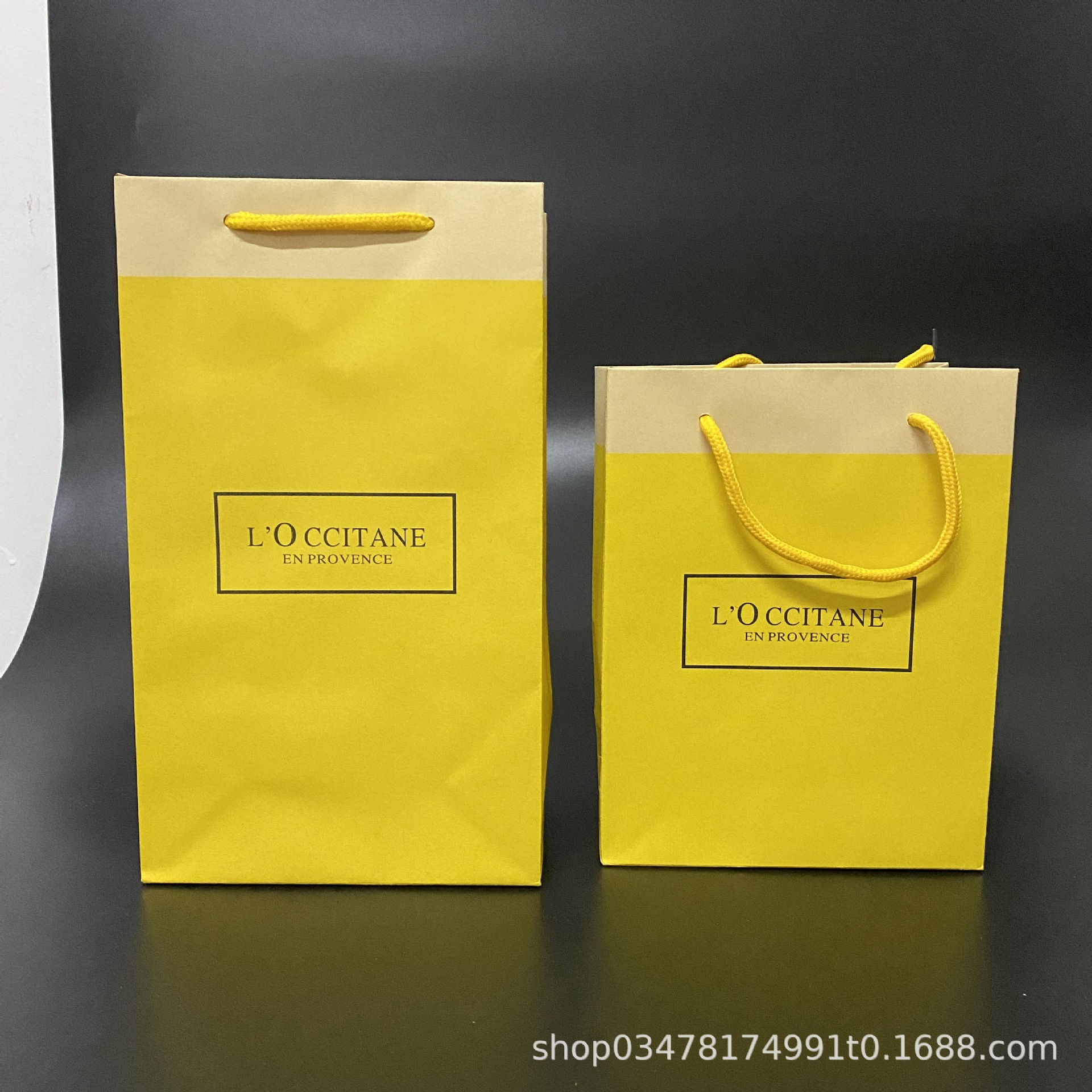 牛皮纸黄色手拎袋礼盒袋化妆品袋欧舒丹香水礼品袋礼盒袋子批发