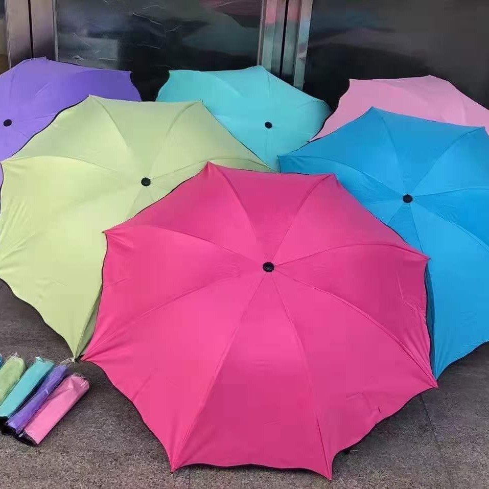 遇水开花伞晴雨两用伞遮阳黑胶三折厂家批发礼品伞logo广告伞批发