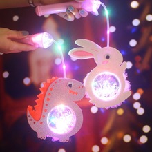 023元宵儿童手提发光兔子灯笼可爱卡通音乐玩具幼儿园创意小花灯