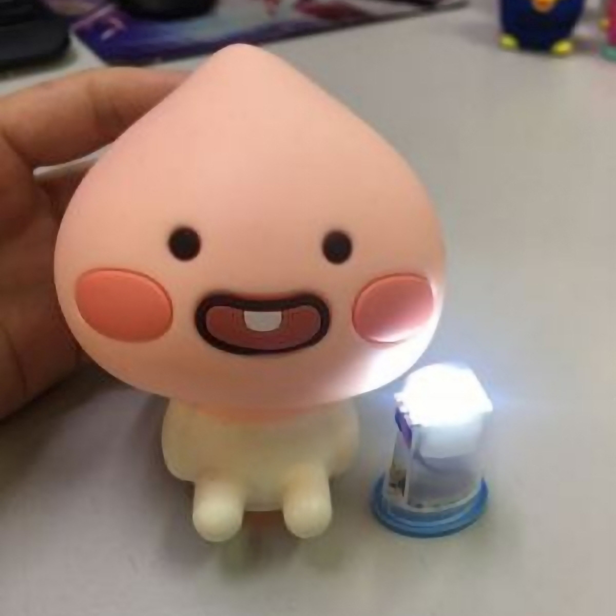 厂家出售 立体可爱屁桃发光公仔机芯 usb充电功能发光公仔机芯