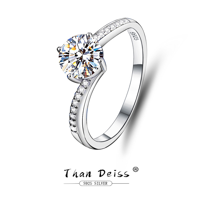 s925纯银镀铂金扭臂四爪莫桑钻戒指1克拉订婚求婚莫桑石戒指女