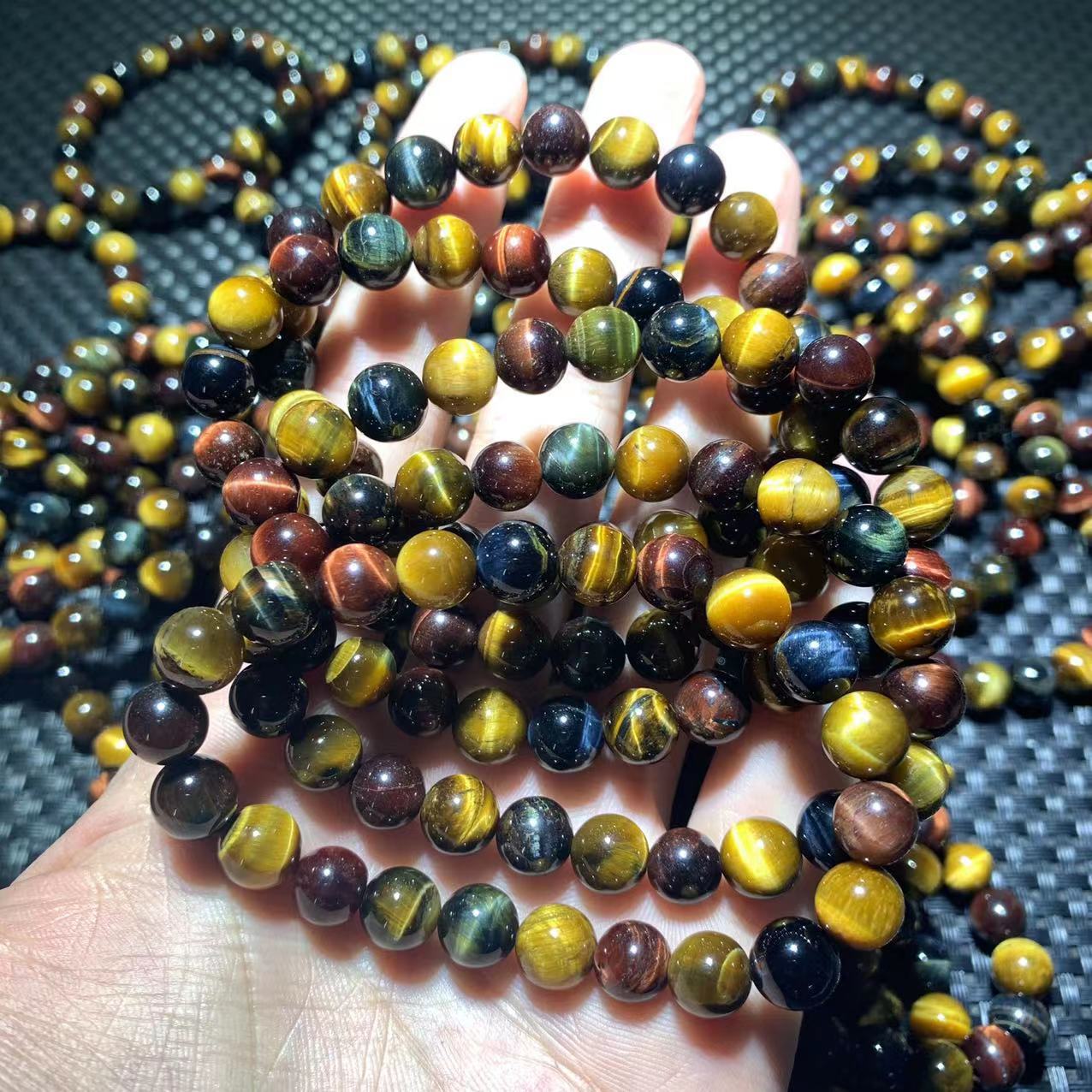天然彩虎眼石手链闪电眼金红黄蓝虎眼石木化石水晶饰品手串批发